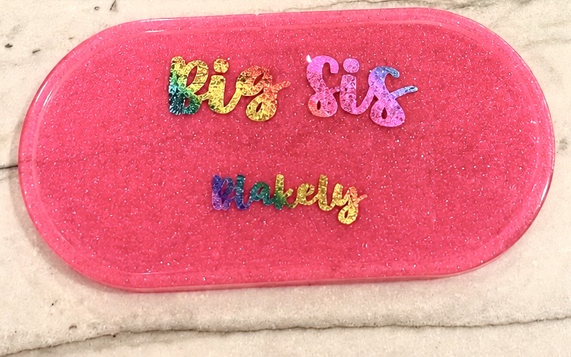 Pink glitter oval resin tray personalized with Big Sis Blakely