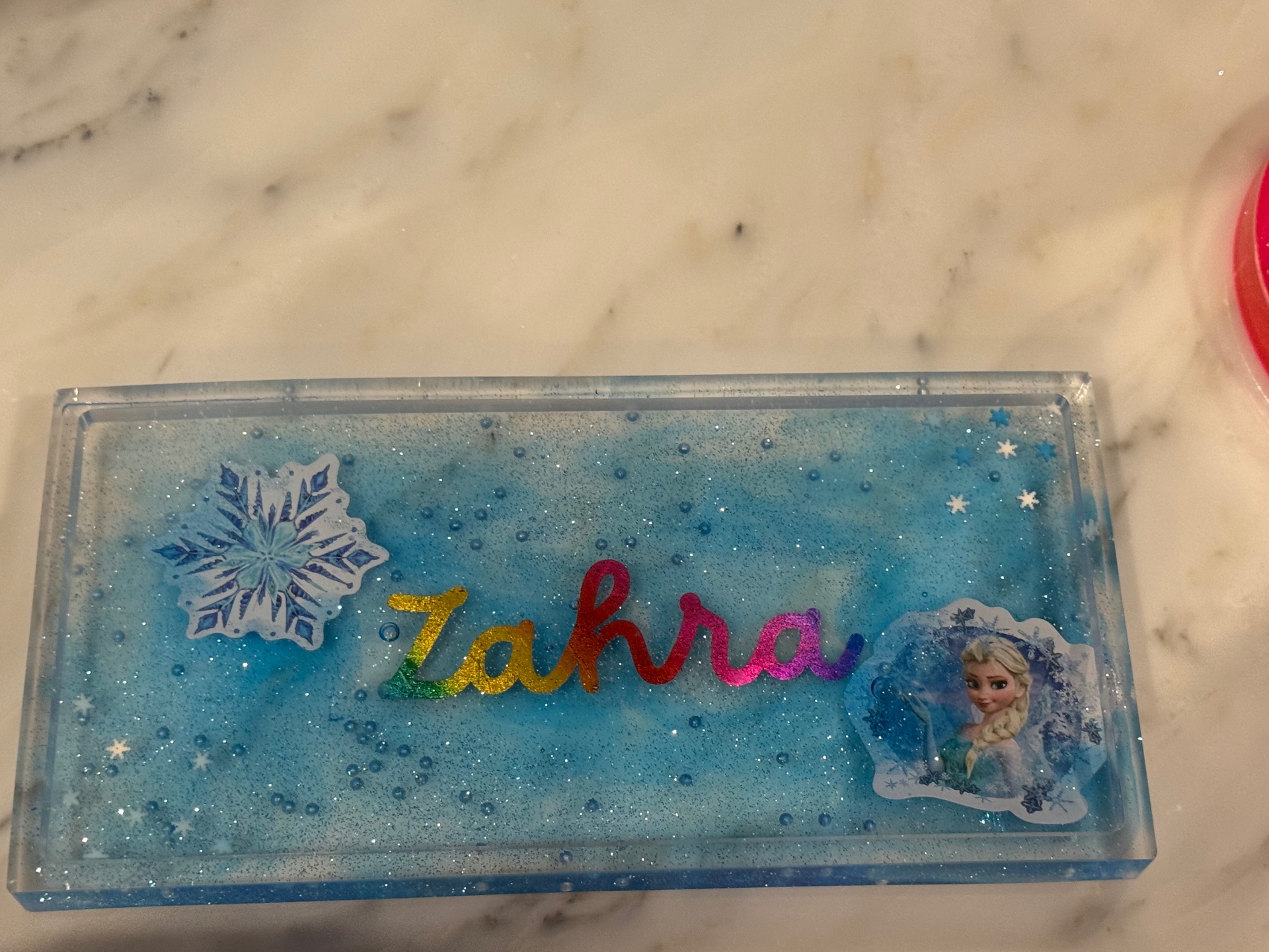 Blue glitter resin tray personalized with the name Zahra